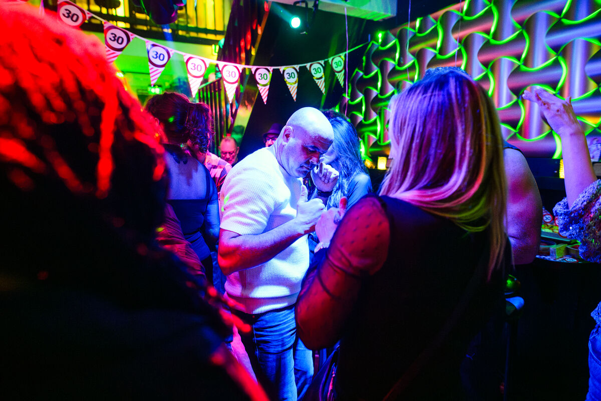 Guests dancing under birthday bunting at Bar Blend Amsterdam