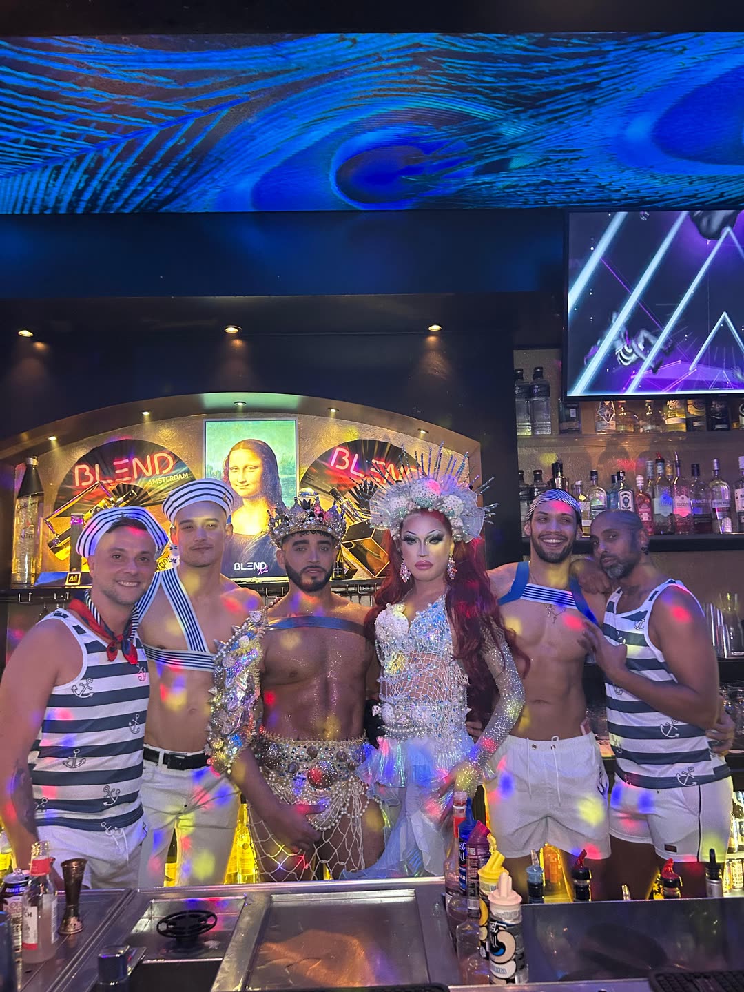 Sailor-themed dancers and a drag queen behind the bar at Blend XL Amsterdam