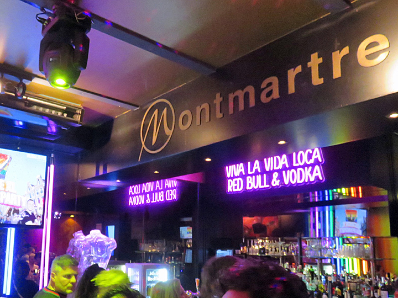The iconic Montmartre XL sign with Viva la Vida Loca neon at the bar in Amsterdam